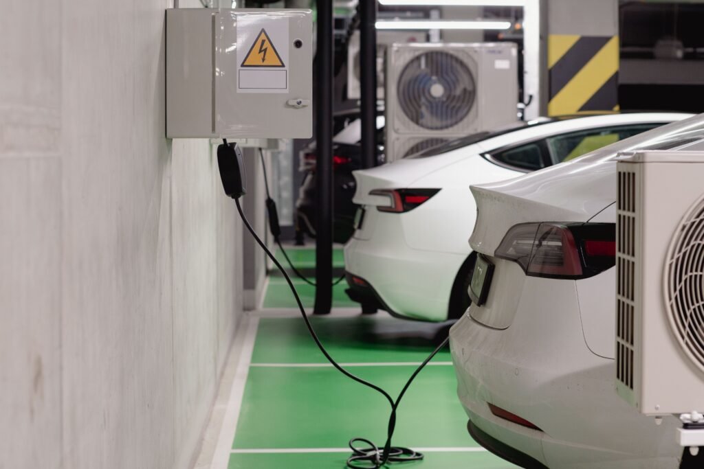 Electric car charging at station